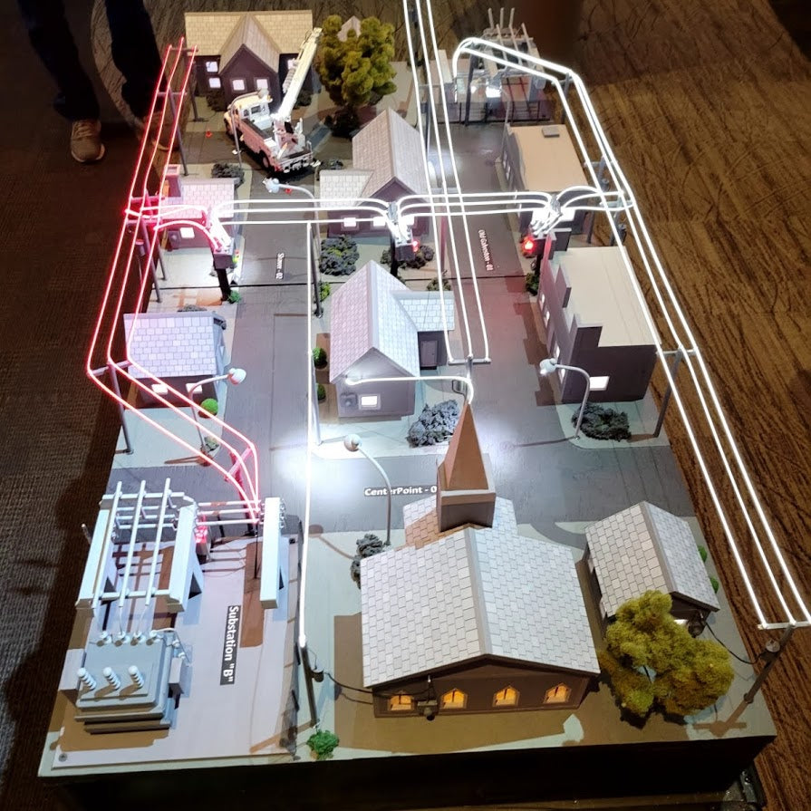 Laser Wire used in a CenterPoint Energy scale model to trace electrical distribution lines through a neighborhood